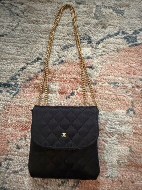 CHANEL Black Quilted mini microbag with Gold Chain Strap